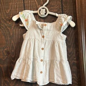 Sage White Blouse with Ruffled Sleeves and Tiered Design